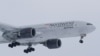 RUSSIA -- A Boeing 777 plane owned by Russia's Nordwind Airlines descends before landing and completing a direct flight from the Venezuelan capital of Caracas at Vnukovo International Airport outside Moscow, January 31, 2019